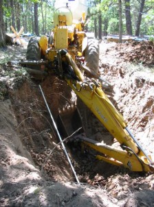 Tractor Dangling in Hole